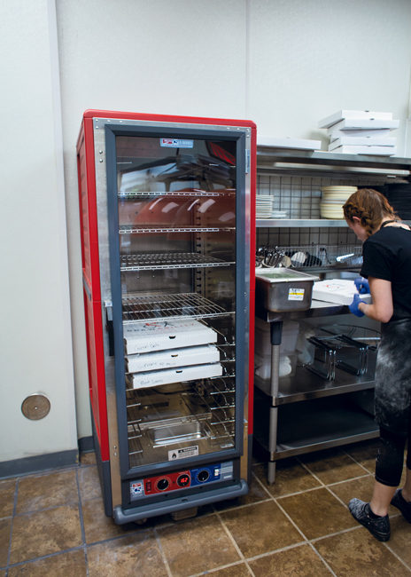 A new heated holding cabinet keeps pizzas warm for pickup orders.