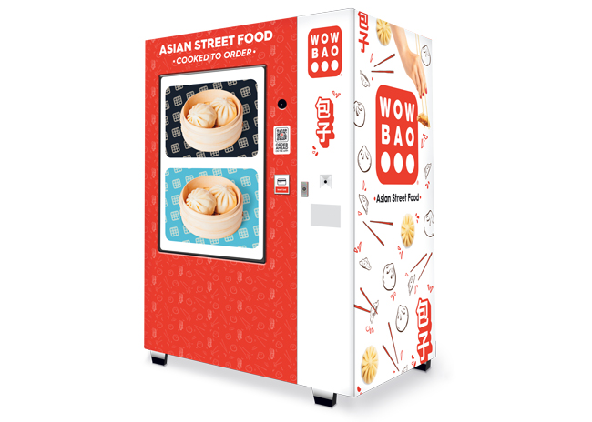 Wow Bao’s newest self-serve initiative is hot food vending kiosks, which dispense its signature steamed bao buns piping hot and ready to eat in 32 seconds.  Photo courtesy of Wow Bao